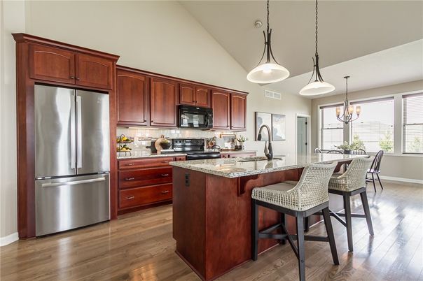 Chandelier, Dining room, Interior, Kitchen, Pendant Lights, Stainless Steel Appliances, Wood Texture Flooring