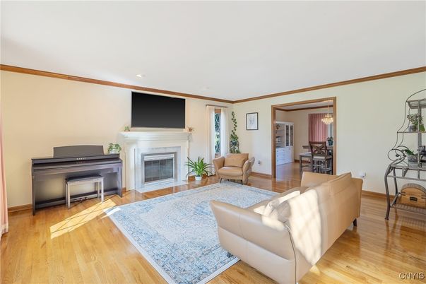 Fireplace, Interior, Living room, Piano, Recessed Lighting, Wood Texture Flooring