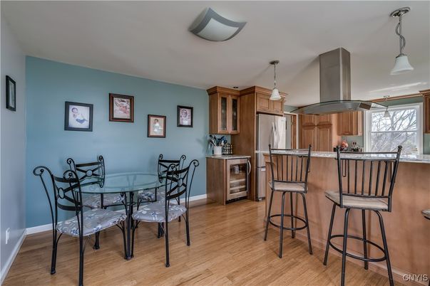 Dining room, Interior, Kitchen, Pendant Lights, Stainless Steel Appliances, Wood Texture Flooring