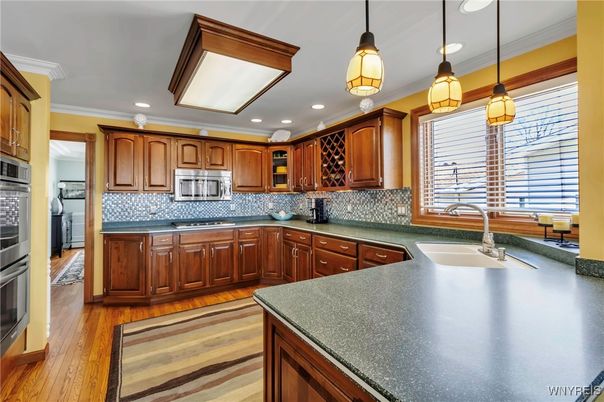 Interior, Kitchen, Pendant Lights, Recessed Lighting, Stainless Steel Appliances, Wood Texture Flooring