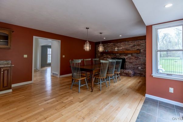 Dining room, Interior, Pendant Lights, Recessed Lighting, Stone Walls, Wood Texture Flooring