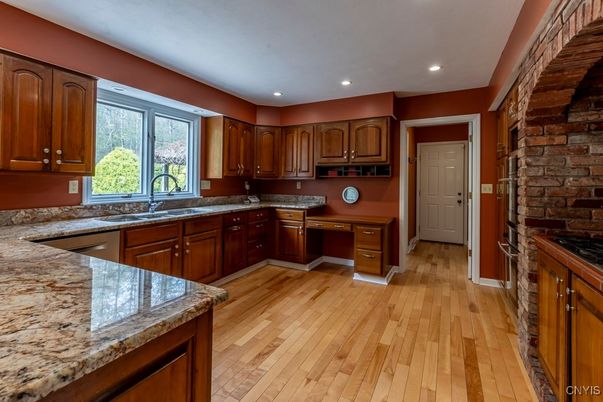 Interior, Kitchen, Recessed Lighting, Stone Walls, Wood Texture Flooring