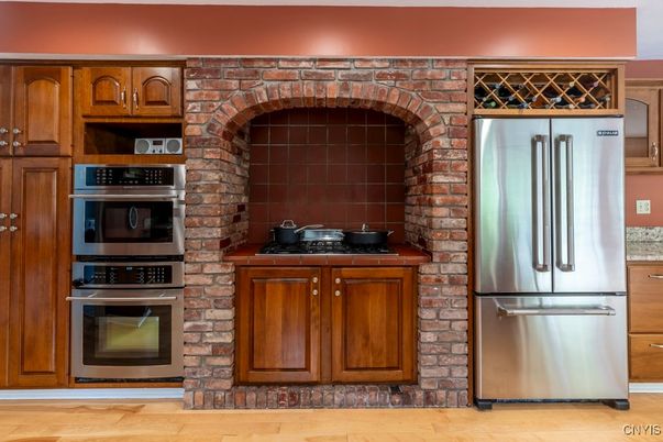 Interior, Kitchen, Stainless Steel Appliances, Stone Walls, Wood Texture Flooring