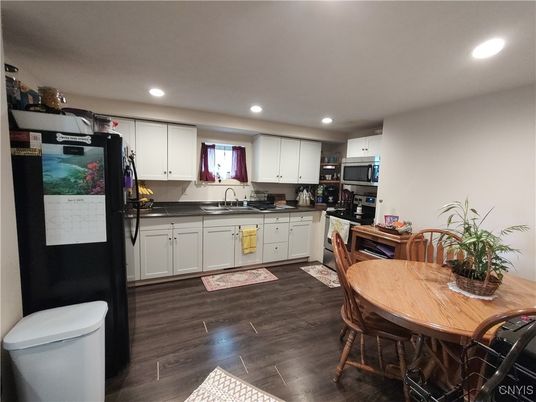 Dining room, Interior, Kitchen, Recessed Lighting, Stainless Steel Appliances, Wood Texture Flooring