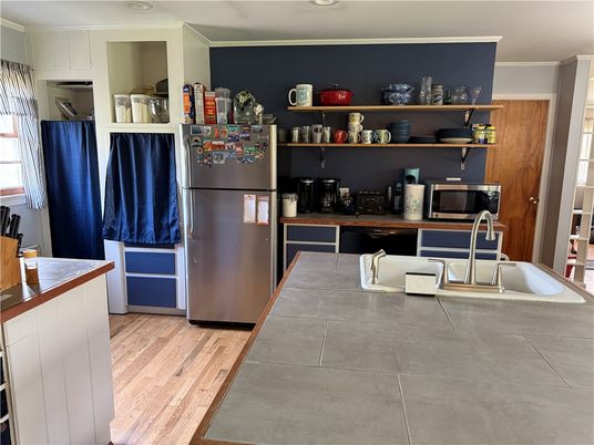 Interior, Kitchen, Tile Countertops, Wood Texture Flooring