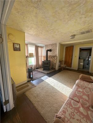 Empty room, Fireplace, Interior, Stone Walls, Wood Texture Flooring