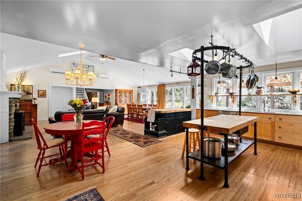 Chandelier, Dining room, Fireplace, Interior, Living room, Pendant Lights, Wood Texture Flooring