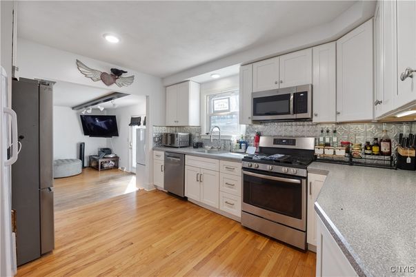 Interior, Kitchen, Recessed Lighting, Stainless Steel Appliances, Wood Texture Flooring