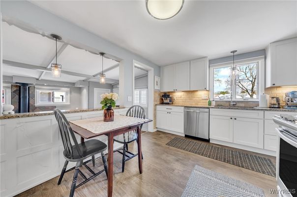 Dining room, Interior, Kitchen, Pendant Lights, Stainless Steel Appliances, Wood Texture Flooring