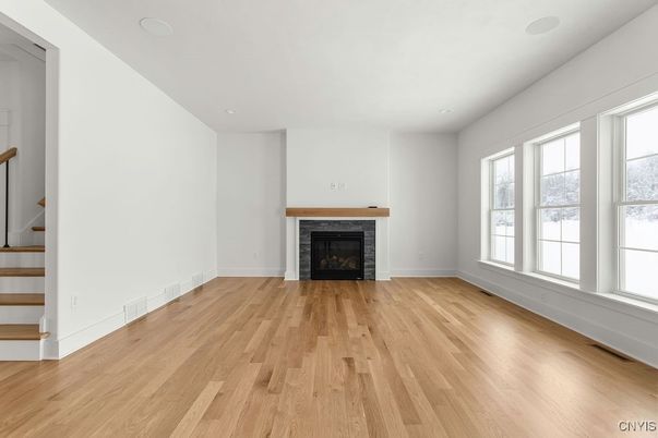 Empty room, Fireplace, Interior, Recessed Lighting, Wood Texture Flooring
