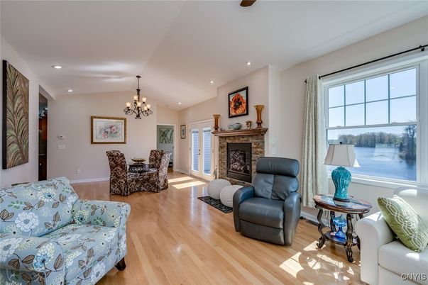 Chandelier, Dining room, Fireplace, Interior, Living room, Recessed Lighting, Wood Texture Flooring