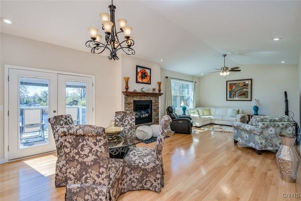 Chandelier, Fireplace, Interior, Living room, Recessed Lighting, Wood Texture Flooring