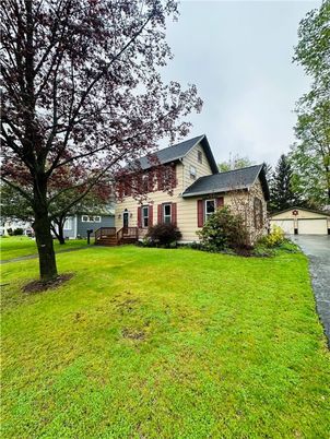 Attached, Backyard, Exterior, Facade, Brick Facade, Cape Cod