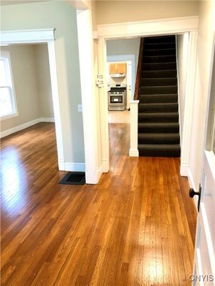 Empty room, Interior, Kitchen, Stainless Steel Appliances, Wood Texture Flooring
