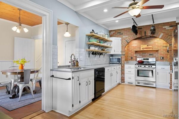 Dining room, Interior, Kitchen, Pendant Lights, Recessed Lighting, Stainless Steel Appliances, Stone Walls, Wood Texture Flooring