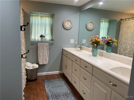 Bathroom, Dual Sink Vanities, Interior, Recessed Lighting, Wood Texture Flooring