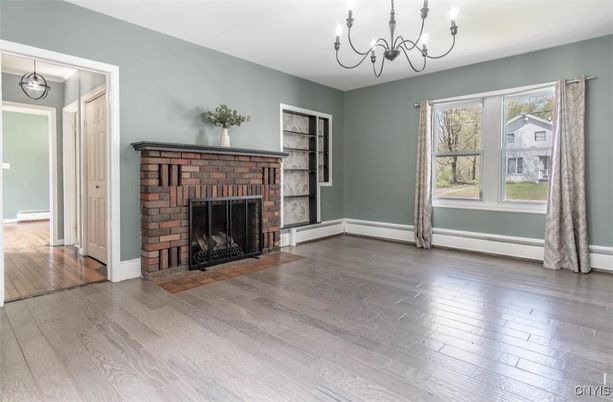 Chandelier, Empty room, Fireplace, Interior, Wood Texture Flooring