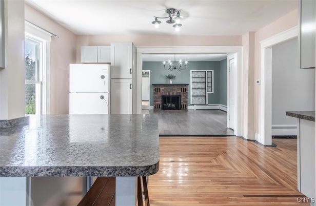 Chandelier, Fireplace, Interior, Kitchen, Wood Texture Flooring