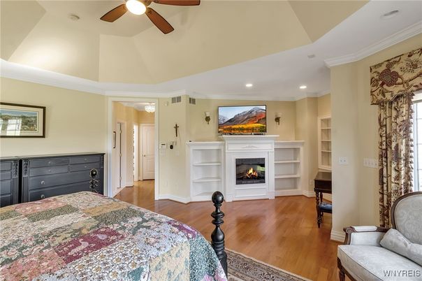Bedroom, Fireplace, Interior, Recessed Lighting, Wood Texture Flooring
