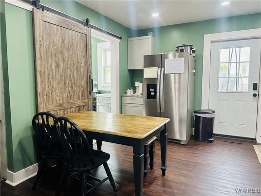 Dining room, Interior, Kitchen, Recessed Lighting, Stainless Steel Appliances, Wood Texture Flooring