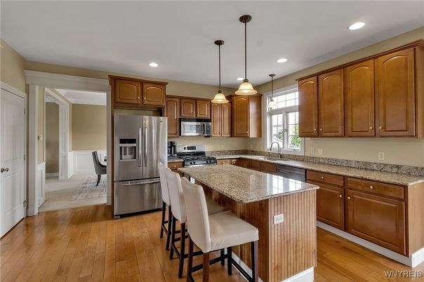 Dining room, Interior, Kitchen, Pendant Lights, Recessed Lighting, Stainless Steel Appliances, Wood Texture Flooring
