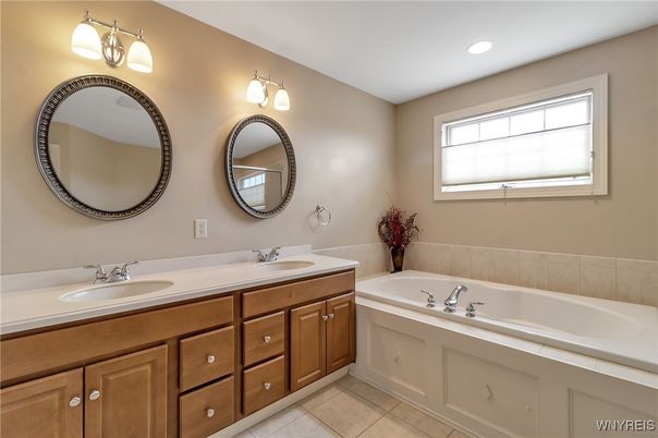 Bathroom, Dual Sink Vanities, Interior, Recessed Lighting, Tile Countertops