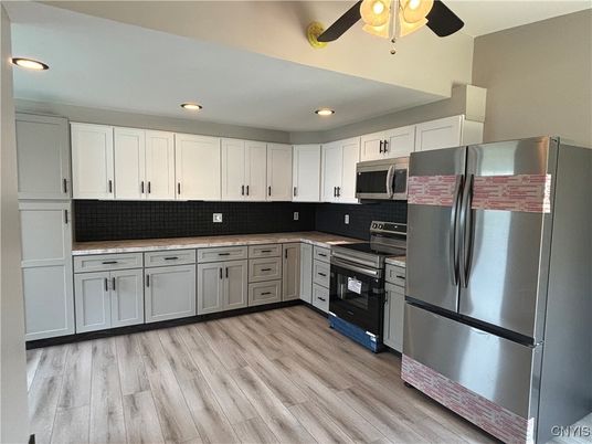 Interior, Kitchen, Recessed Lighting, Stainless Steel Appliances, Wood Texture Flooring