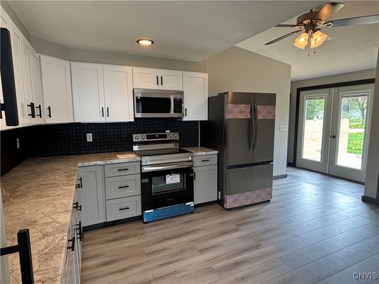 Interior, Kitchen, Recessed Lighting, Stainless Steel Appliances, Wood Texture Flooring