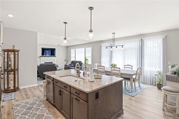 Dining room, Fireplace, Interior, Kitchen, Living room, Pendant Lights, Recessed Lighting, Wood Texture Flooring