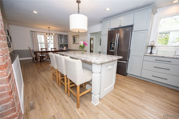 Dining room, Interior, Kitchen, Pendant Lights, Recessed Lighting, Stainless Steel Appliances, Wood Texture Flooring
