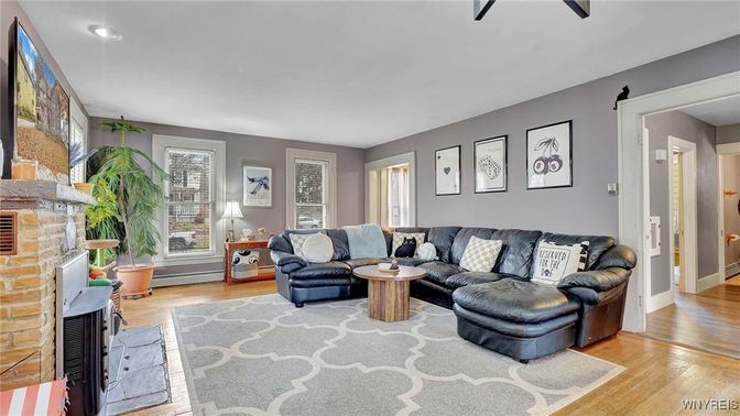 Fireplace, Interior, Living room, Recessed Lighting, Stone Walls, Wood Texture Flooring