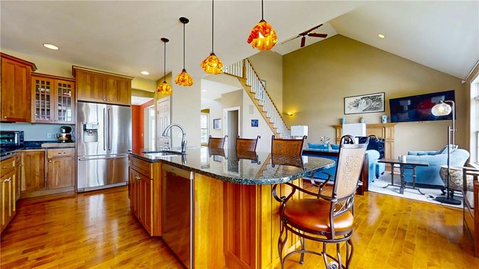 Dining room, Interior, Kitchen, Pendant Lights, Recessed Lighting, Stainless Steel Appliances, Wood Texture Flooring