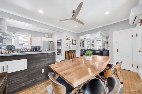 Dining room, Interior, Kitchen, Recessed Lighting, Stainless Steel Appliances, Wood Texture Flooring