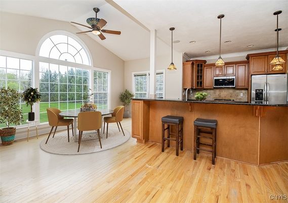 Dining room, Interior, Kitchen, Pendant Lights, Recessed Lighting, Stainless Steel Appliances, Wood Texture Flooring