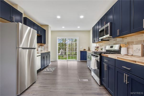 Interior, Kitchen, Recessed Lighting, Stainless Steel Appliances, Wood Texture Flooring