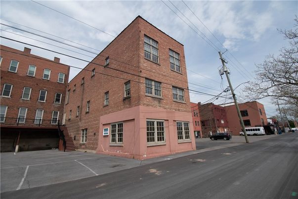 Exterior, Facade, Brick Facade, Condo Building