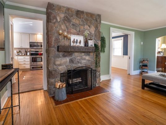 Fireplace, Interior, Kitchen, Stainless Steel Appliances, Stone Walls, Wood Texture Flooring