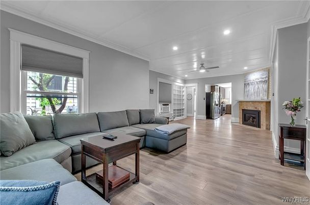 Fireplace, Interior, Living room, Recessed Lighting, Wood Texture Flooring