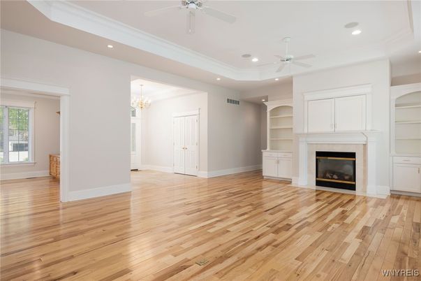 Chandelier, Empty room, Fireplace, Interior, Recessed Lighting, Wood Texture Flooring