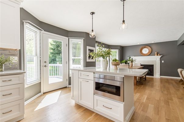 Dining room, Fireplace, Interior, Pendant Lights, Wood Texture Flooring