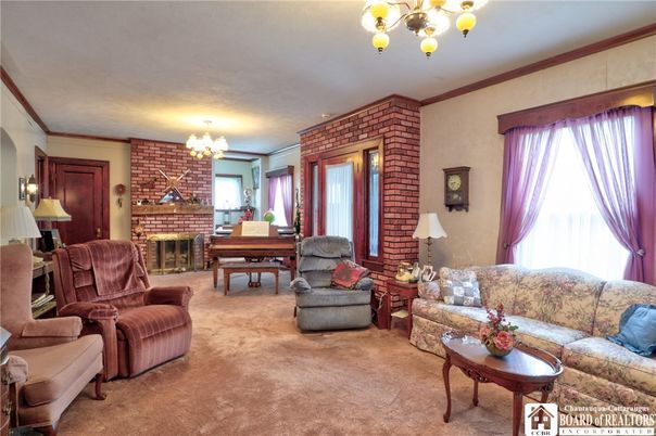 Chandelier, Dining room, Fireplace, Interior, Living room, Stone Walls