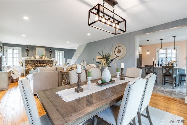 Dining room, Fireplace, Interior, Living room, Pendant Lights, Recessed Lighting, Wood Texture Flooring