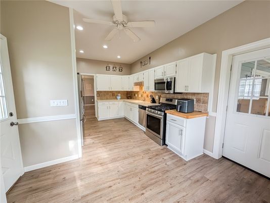 Interior, Kitchen, Recessed Lighting, Stainless Steel Appliances, Wood Texture Flooring