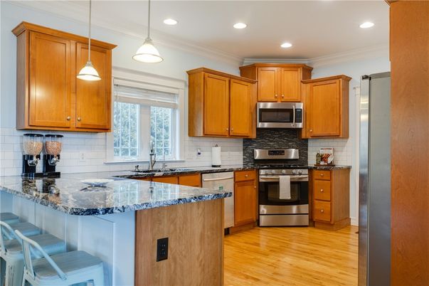 Interior, Kitchen, Pendant Lights, Recessed Lighting, Stainless Steel Appliances, Wood Texture Flooring