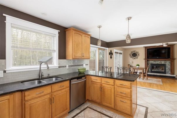 Dining room, Fireplace, Interior, Kitchen, Pendant Lights, Stainless Steel Appliances