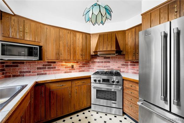 Interior, Kitchen, Stainless Steel Appliances, Tile Countertops