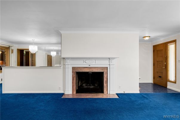 Chandelier, Empty room, Fireplace, Interior