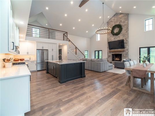 Dining room, Fireplace, Interior, Kitchen, Living room, Pendant Lights, Recessed Lighting, Stainless Steel Appliances, Stone Walls, Wood Texture Flooring