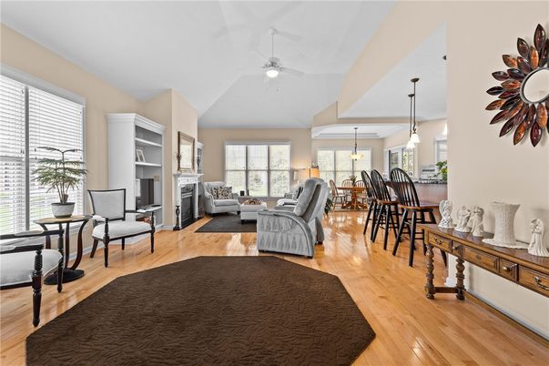 Dining room, Fireplace, Interior, Living room, Pendant Lights, Wood Texture Flooring