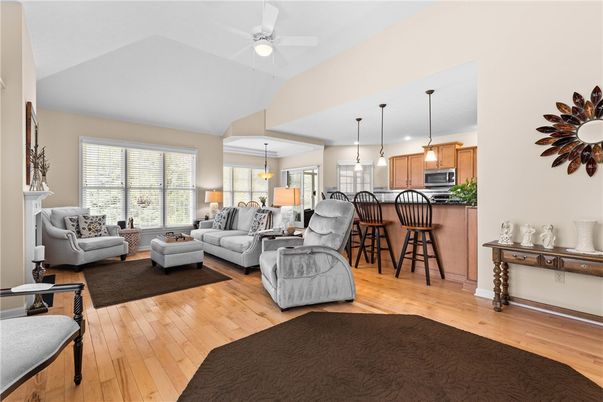 Fireplace, Interior, Kitchen, Living room, Pendant Lights, Stainless Steel Appliances, Wood Texture Flooring